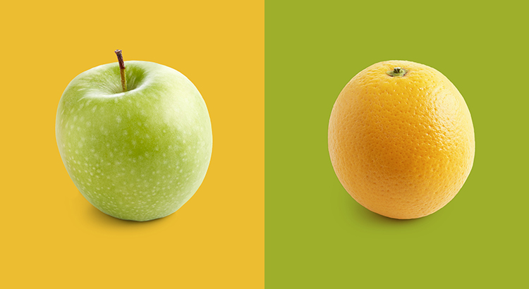 Apple and orange against yellow and green background